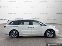 Simplify family journeys with the 2016 Honda Odyssey Touring. This white minivan, with 157,038 kilom... (image 7)