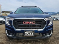 The 2022 GMC Terrain AWD SLE in a captivating Blue shade and equipped with an AWD drivetrain deliver... (image 2)