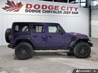 This Jeep Wrangler boasts a Gas/Electric V-6 3.6 L/220 engine powering this Automatic transmission.... (image 5)