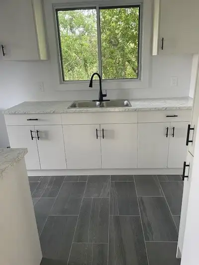 Ouest de lisle, maison de ville rénovée, de style condo.