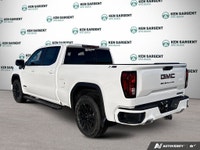 The 2026 GMC Sierra 1500 Elevation in a striking White finish is the perfect combination of power an... (image 4)