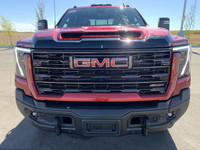 AMVIC Licensed Dealer The 2026 GMC Sierra HD AT4X AEV Edition in Volcanic Red Tintcoat is engineered... (image 1)