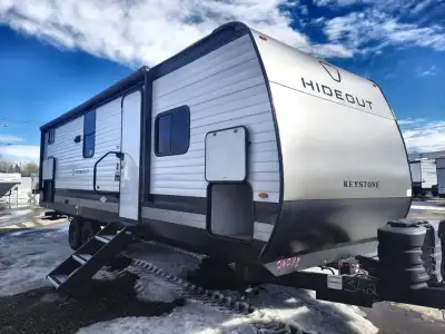 Keystone Hideout travel trailer 262BHS highlights: Front Private Bedroom 20' Power Awning with LED L...