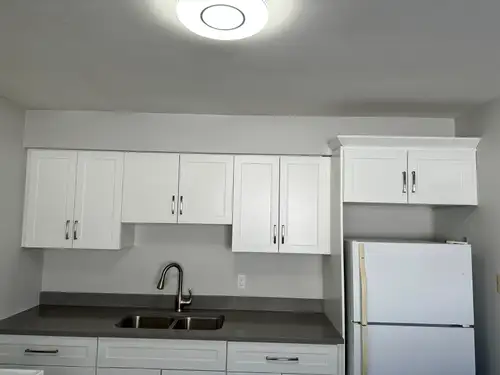 Full detailed description below: * Two bedroom apartment located on the top floor of a triplex build...
