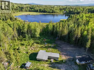 This 9.6-acre property is offered as bare land and includes a chicken coop, several outbuildings, so...