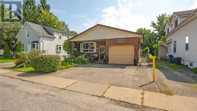 Welcome home to this updated bungalow with a practical layout and attached garage. Main level featur...