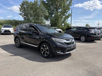 Le Honda CR-V Touring 2018 est un VUS compact haut de gamme reconnu pour sa fiabilité, son confort e... (image 1)