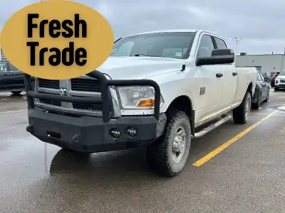 Built tough for demanding work and rugged terrain, the 2012 RAM 3500 SLT Crew Cab Long Bed 4x4 Diese...