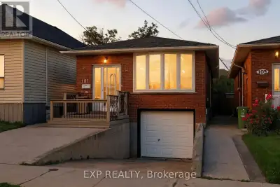 Beautifully Renovated Solid Brick Bungalow with a Complete In-Law Suite! Main floor features a gorge...