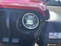 Introducing the vibrant 2022 Jeep Wrangler Unlimited Willys 4x4 in an eye-catching Firecracker Red,... (image 9)