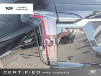 The 2025 Cadillac XT6 AWD Sport, dressed in a sophisticated Stellar Black Metallic exterior and a lu... (image 7)