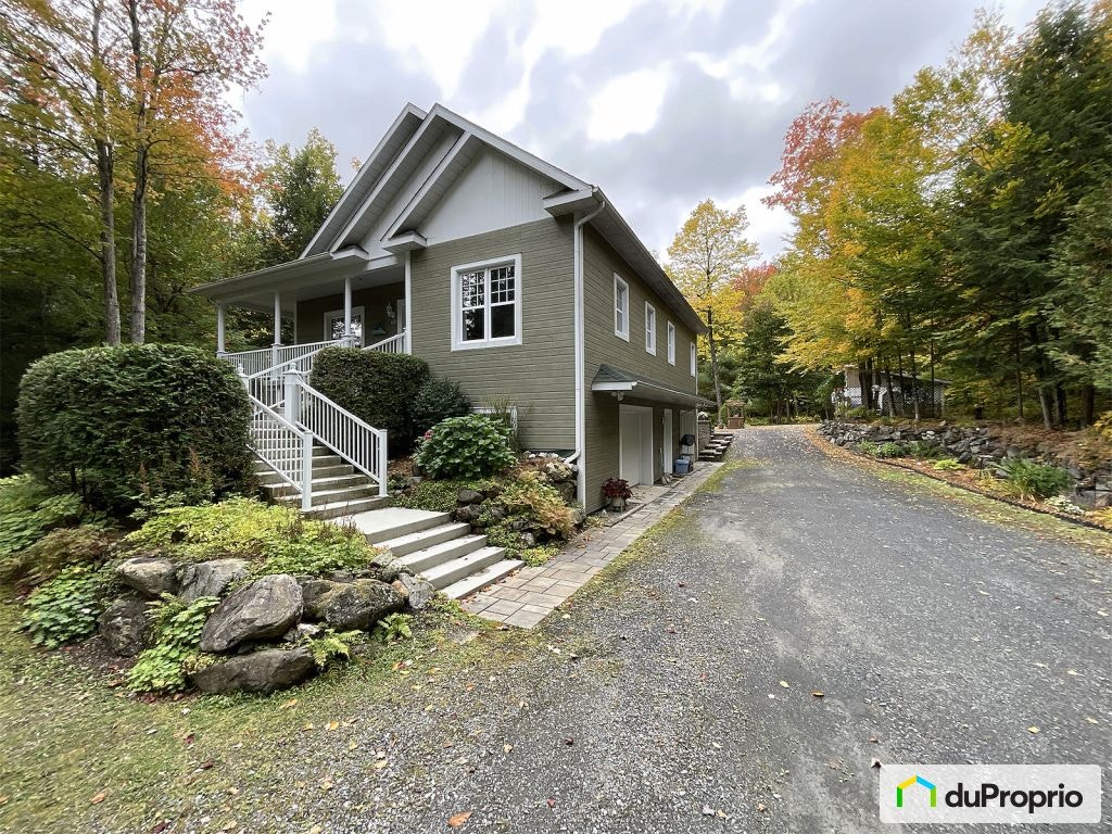 $952,500 - Bungalow for sale in Bolton-Est — photo 1