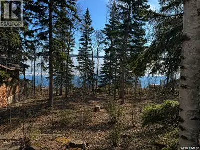 RARE EMMA LAKE WATERFRONT OPPORTUNITY! Build your dream cabin or year-round lake retreat on this exc...