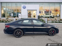 This Volkswagen Jetta GLI boasts a Intercooled Turbo Premium Unleaded I-4 2.0 L/121 engine powering... (image 5)