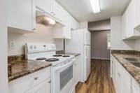 Amenities: In-suite Laundry • Playground • Private Yard Suite & Building: Two-bedroom and three-bedr... (image 1)