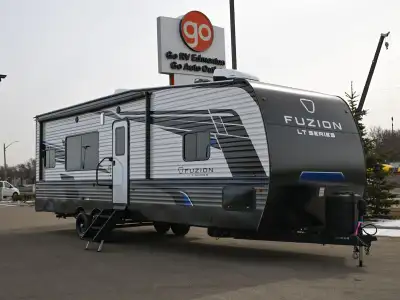 The 2026 Impact 2915 is a toy hauler travel trailer from Keystone that blends living space with a ga...