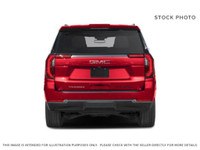 The 2026 GMC Yukon 4WD AT4 Ultimate in striking Onyx Black with Obsidian Rush interior and red accen... (image 3)