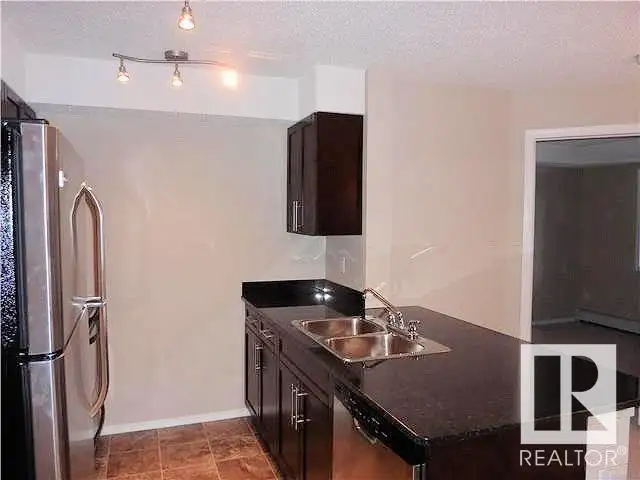 #205 11816 22 AV SW Edmonton, Alberta62866663332483124