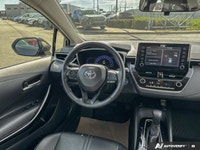 Experience unparalleled peace of mind and remarkable efficiency with the 2021 Toyota Corolla Hybrid,... (image 8)
