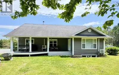 Escape to tranquility with this stunning 2,600 sq ft custom bungalow nestled on 2.24 acres in pictur...
