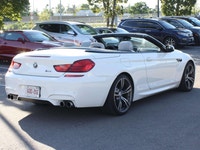 Experience exhilarating performance, open-air luxury, and unmistakable BMW M engineering with this 2... (image 3)