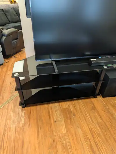 3 TIER GLASS TV STAND WITH TV MOUNT $50 EACH (2 AVAILABLE) ITEMS ARE PREVOUISLY ENJOYED UNLESS OTHER...