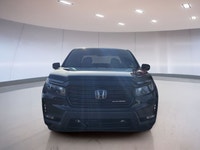 Experience the 2022 Honda Ridgeline Black Edition, where luxury meets functionality. Enjoy keyless e... (image 4)