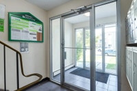 Amenities: Green Space • Affordable Parking • Heat & Water Included Suite & Building: Bachelor, one-... (image 6)