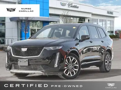 The 2025 Cadillac XT6 AWD Sport, dressed in a sophisticated Stellar Black Metallic exterior and a lu...