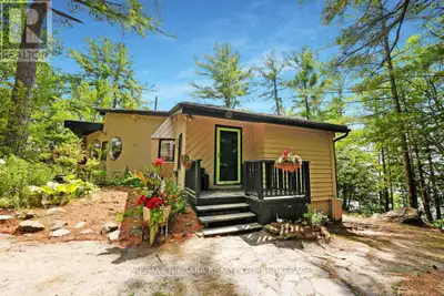 A stunning point lot on 12 Mile Lake, with well over 500' of waterfront and an acre of land plus 4 a...