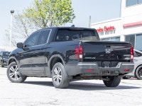 Experience the perfect blend of pickup capability, everyday comfort, and Honda reliability with the... (image 4)