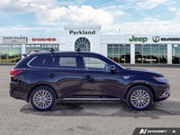 The 2022 Mitsubishi Outlander PHEV Black Edition brings together modern efficiency, bold styling, an... (image 6)