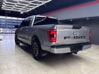Experience the renowned 2022 Ford F-150 XLT 4x4 SuperCrew in a striking Silver finish, built for bot... (image 5)