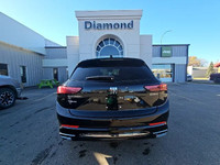 Where Luxury Meets ConfidenceElevate your daily drive with the 2024 Buick Envision Sport Touring AWD... (image 5)