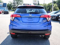 Experience the excitement of driving the **2019 Honda HR-V Sport** in stunning blue, equipped with a... (image 3)