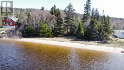 Waterfront cottage lot on the Old Road at Bonne Bay Big Pond, offering year-round access on a govern...