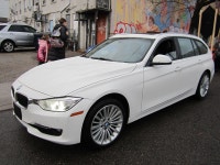 ALL WHEEL DRIVE WAGON. FINISHED IN ARTIC WHITE WITH BLACK LEATHER INTERIOR. ALLY WHEELS WITH NEW TIR... (image 1)