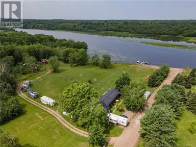 Welcome to this unique and versatile property, set on approximately 500 feet of pristine waterfront...
