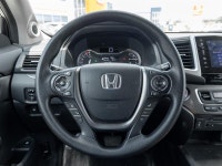 Discover spacious versatility and dependable capability with the 2017 Honda Pilot V6 LX. Finished in... (image 8)