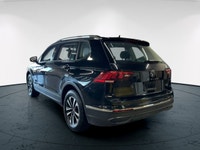 The 2024 Volkswagen Tiguan Trendline 4MOTION in black is an impressive AWD SUV that offers remarkabl... (image 2)