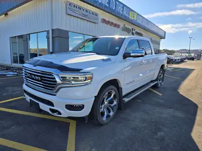 For a quick response please text 403-820-9940. AMVIC licensed business The 2022 Ram 1500 Limited Lon...