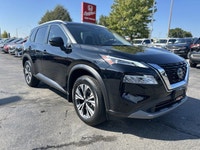 Slide into this sleek 2022 Nissan Rogue SV, boasting a Super Black exterior and a surprisingly spaci... (image 2)