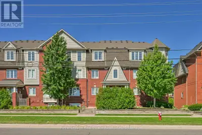 Rare, Modern Loft-Style 1,045sf Corner END Unit Townhome With Open Concept Living Space. This Fully...