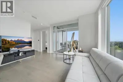 Elevated SUB-PENTHOUSE LUXURY at Cambie Gardens by Onni! Perched on the 22nd floor, this RARE CORNER...