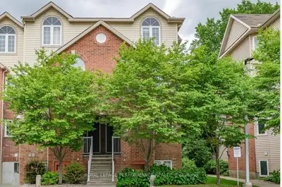 Move-in ready 3-bed, 2-bath end-unit terrace home, ideally situated on a quiet, family-friendly cul-...