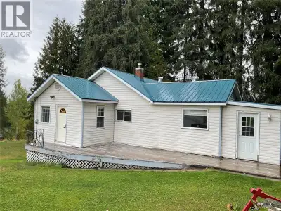 Country Living Close to Town!Looking for space, privacy, and room to pursue your hobbies? This charm...