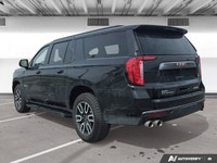 Experience the premium capability and rugged refinement of the 2023 GMC Yukon XL AT4. This used full... (image 3)