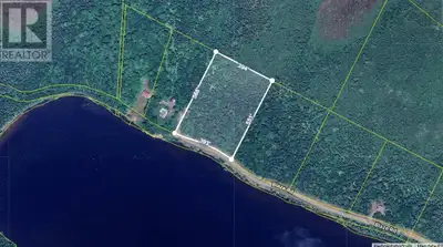 This 5.38-acre wooded waterfront parcel is located in the quiet coastal community of Loch Lomond and...
