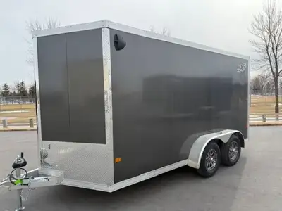 Triton 7x14 cargo trailer with ramp door. Torsion axles, 82 inch interior wall height, hd tie down r...