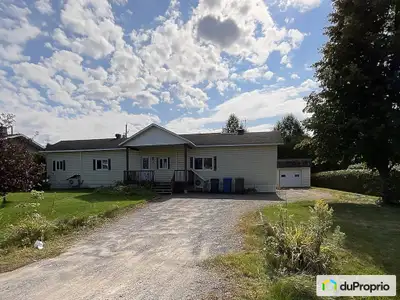 Belle propriété située dans Saint-Paul à proximité d'autoroute, d'école, de magasin, de parc et plus...